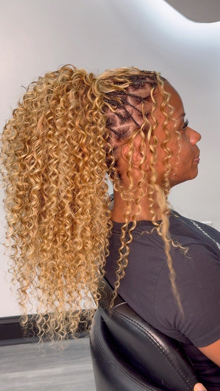 Curly braided ponytail with tight scalp braids and long golden-blonde curls