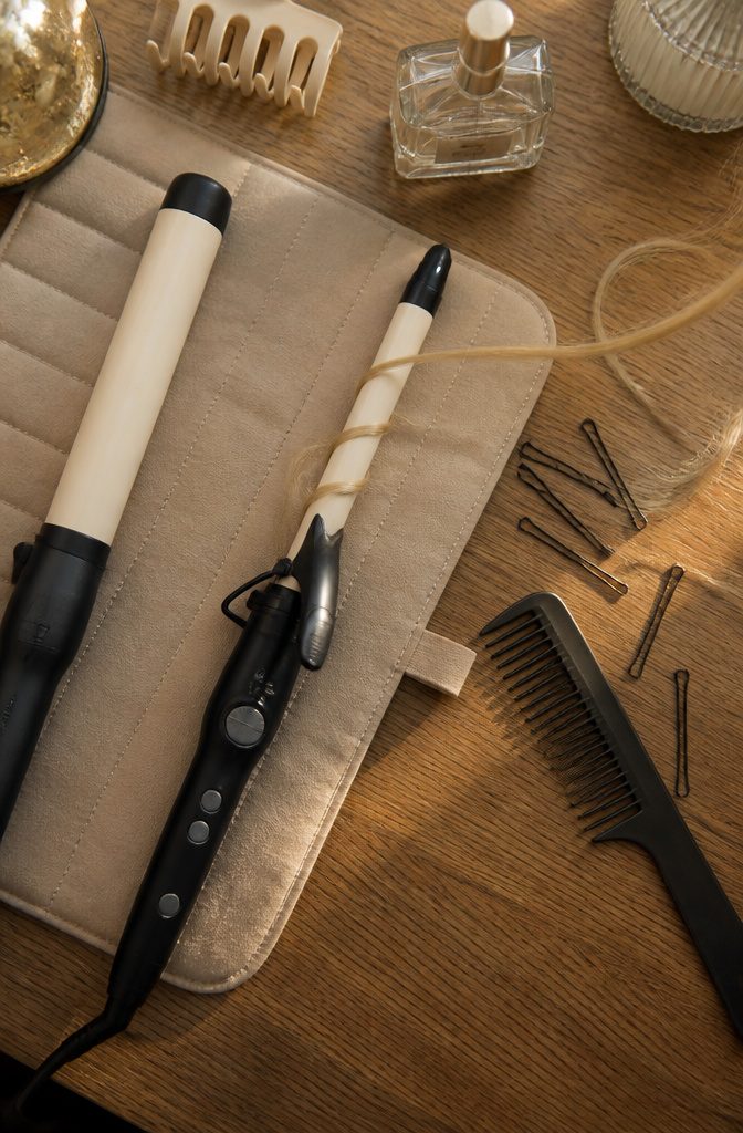 Small curling iron beside a tight curl in fine hair