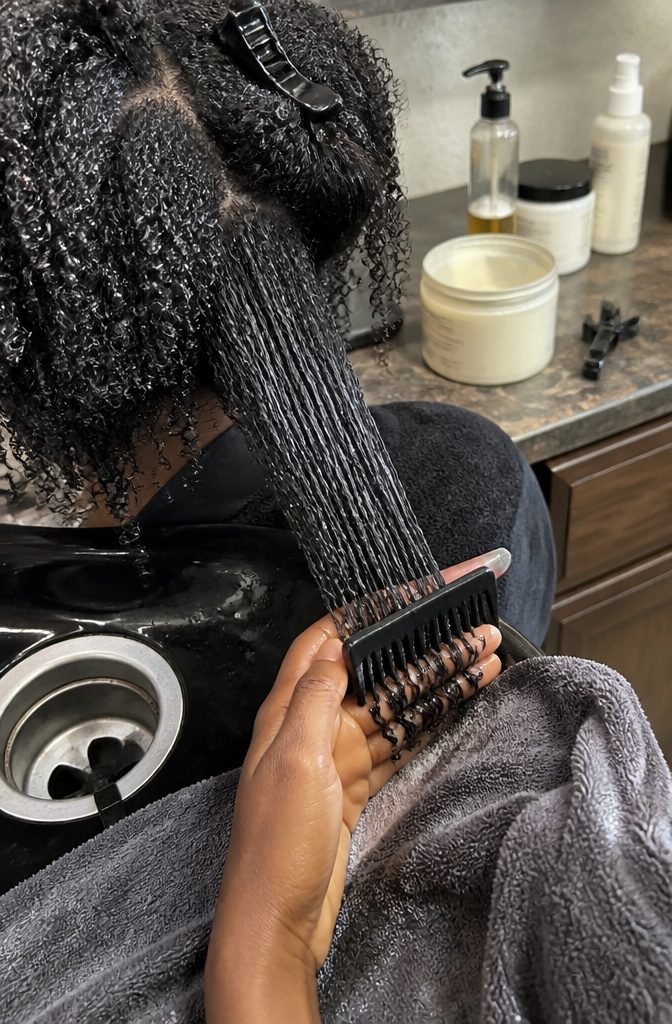Hair with defined springy coils and full volume