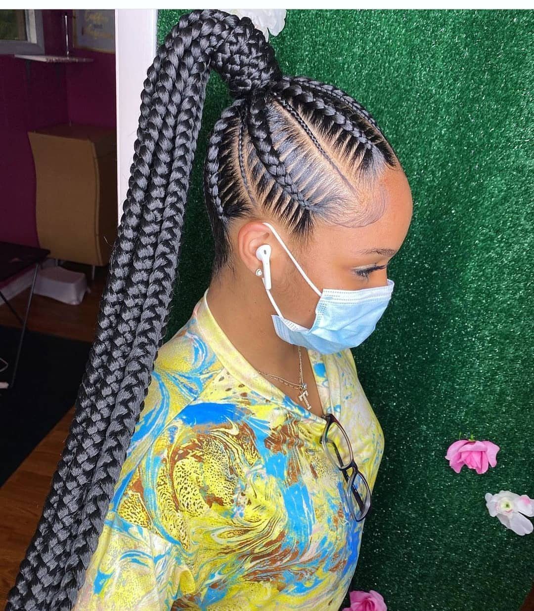 High braided ponytail with neat cornrows on a woman in profile