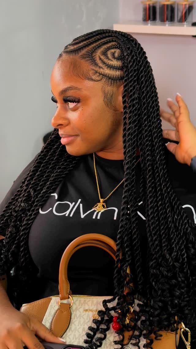 Woman showcasing Fulani braids with curved cornrows and long individual braids