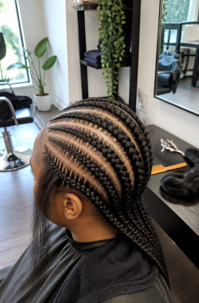 Feed-in cornrows with gradual natural-looking hairline starts