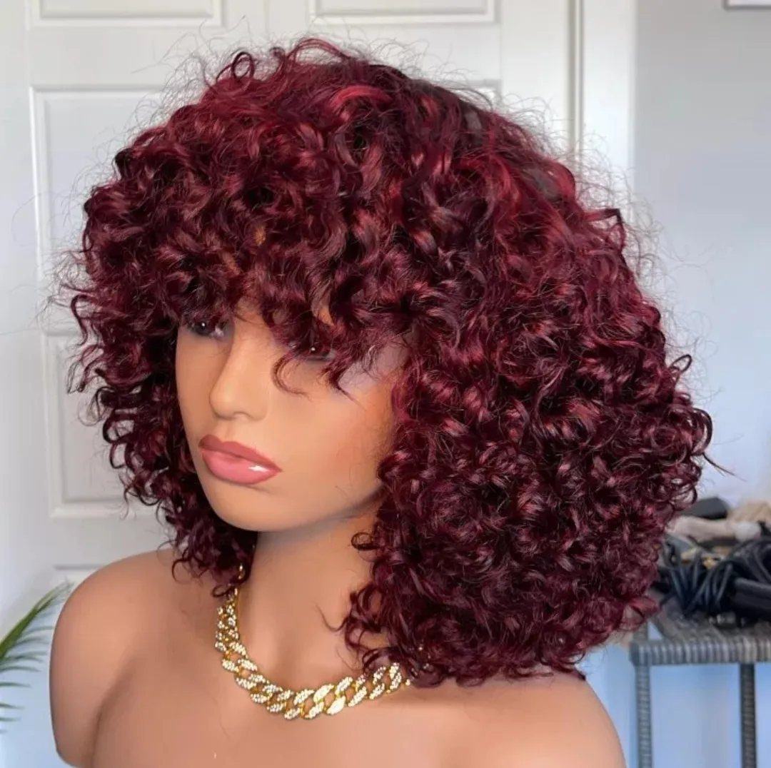 Mannequin with a voluminous burgundy curly bob and bangs
