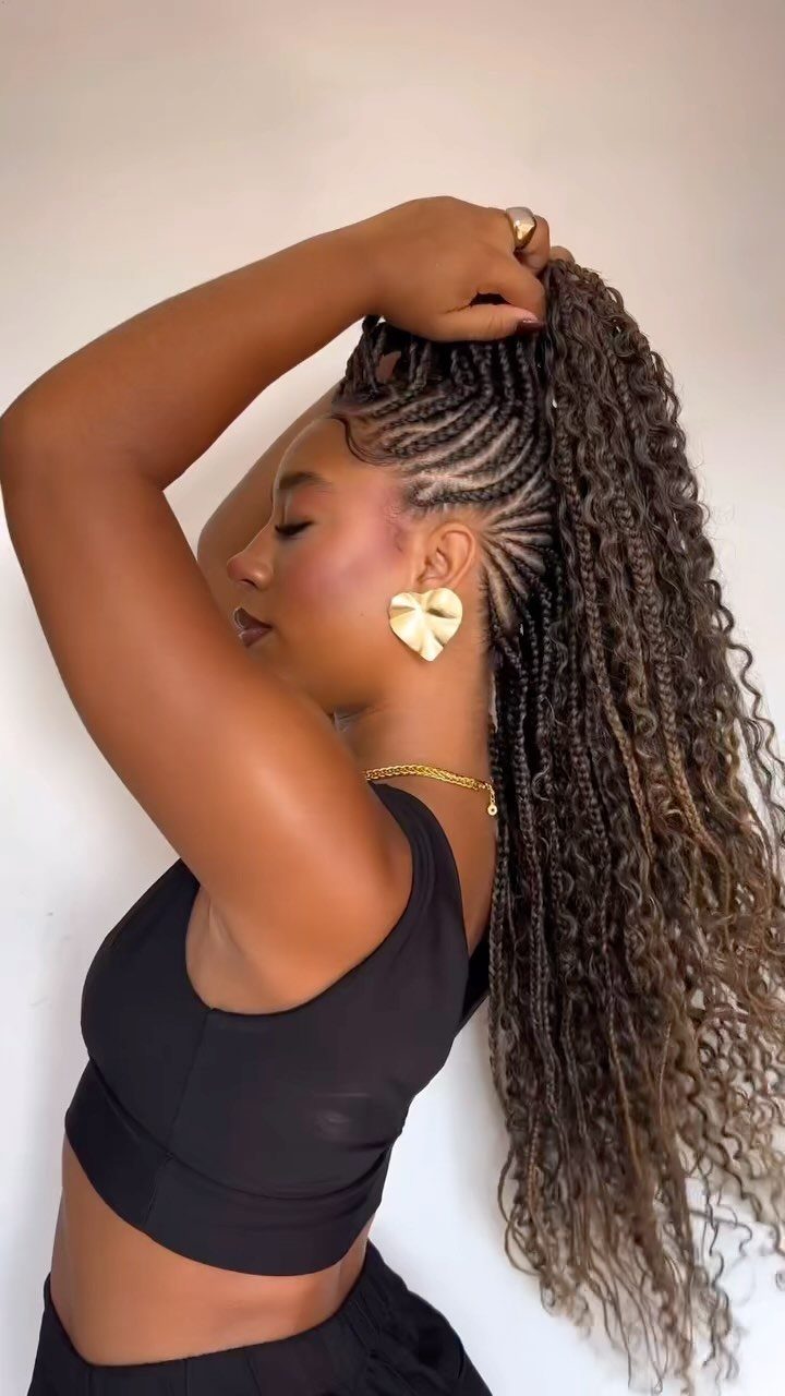 Woman showcasing long Havana twists with cornrow detailing and textured ends