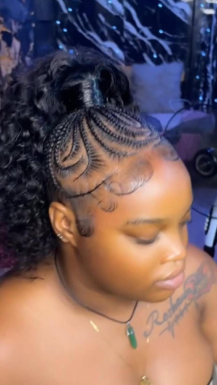 Woman wearing a high curly ponytail with braided edges and styled baby hairs