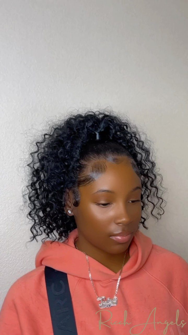 Young woman showing a high half-up ponytail with long curls left down