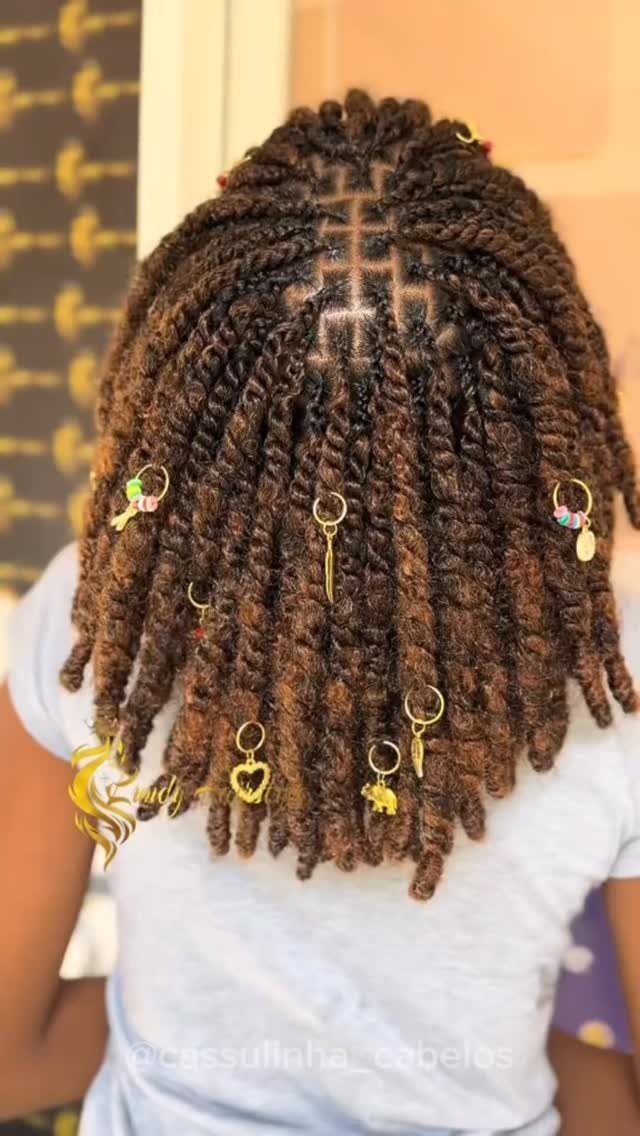 Thick brown Marley twists with gold charms viewed from the back