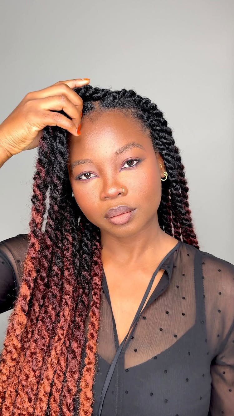 Woman wearing long black and copper two-tone Marley twists