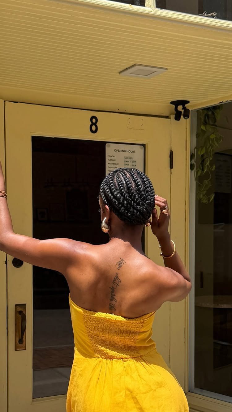 Close-set flat twists cover the back of a person's head