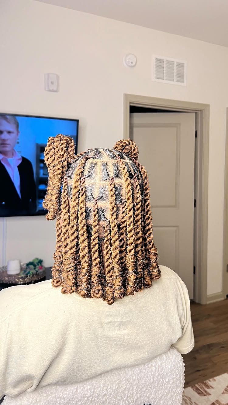 Jumbo twists arranged in a rounded bob with two small top buns