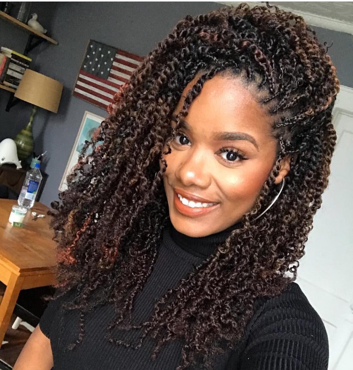 Woman wearing long kinky twists with springy ringlet ends